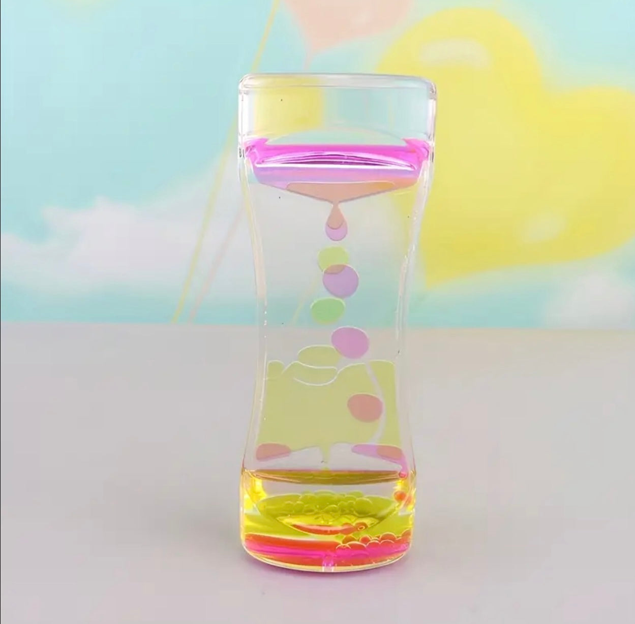 liquid motion hourglass toy